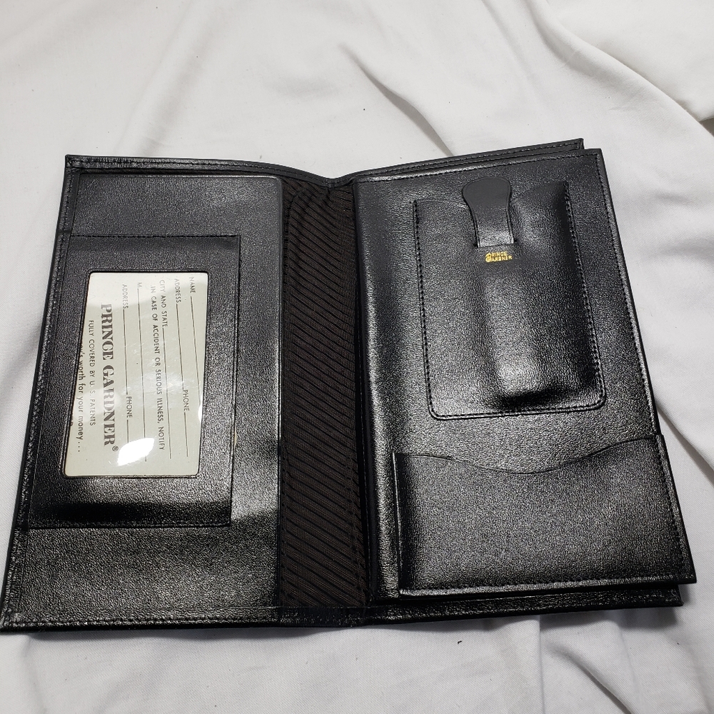 B8,356 Prince Gardner Travel Wallet